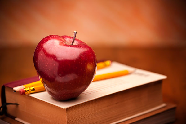 Apple over a book