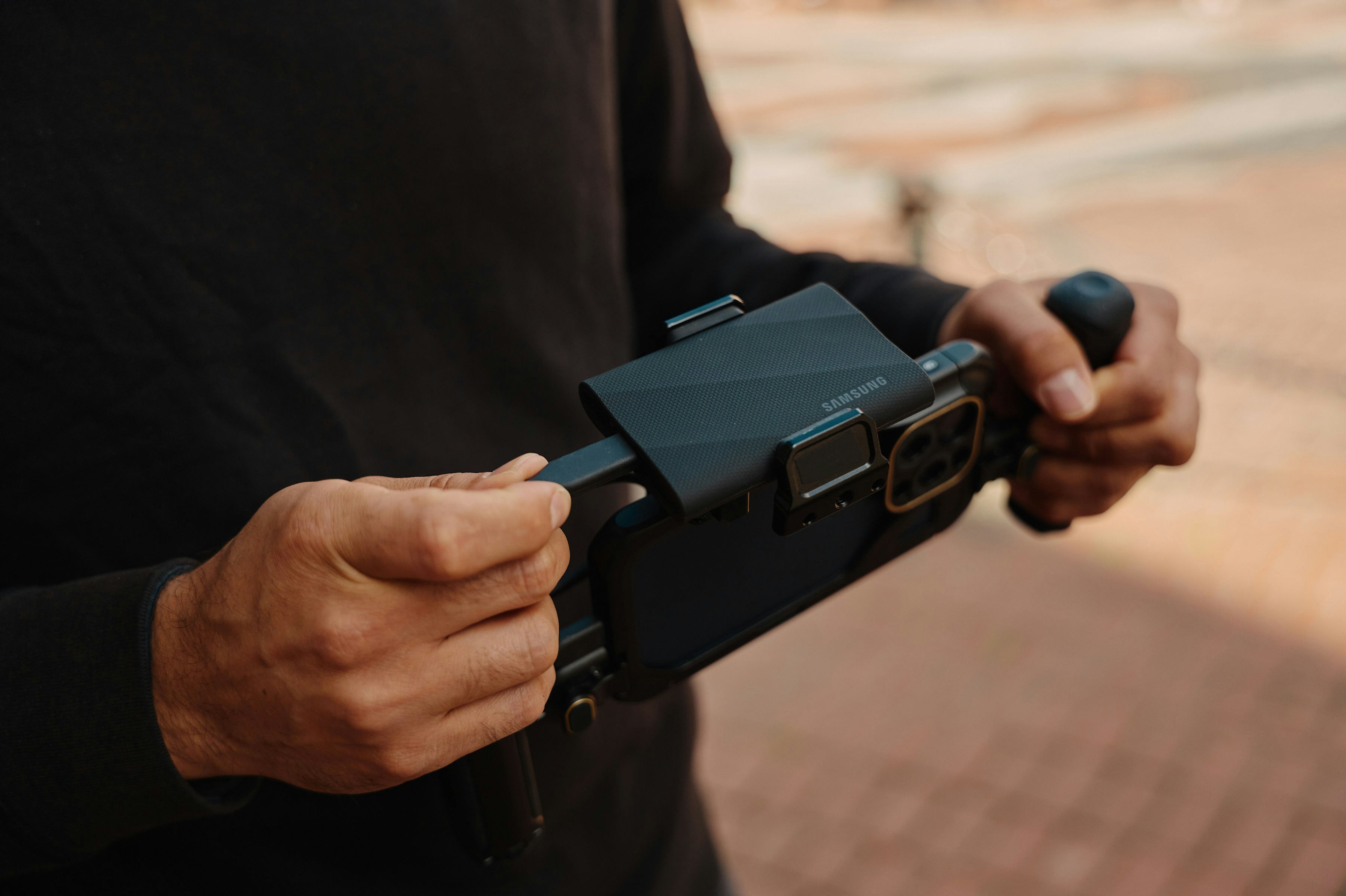 A man holding a camera in his hands