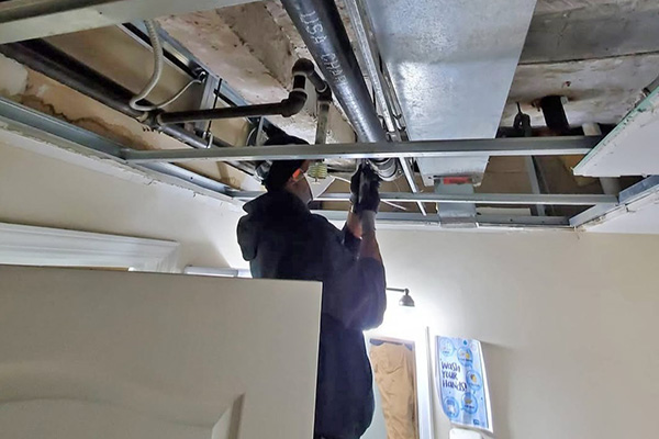 Man fixing a pipe