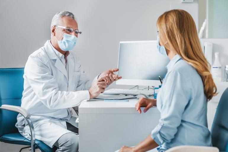 Young doctor and patient