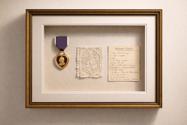 Shadow box display of family heirlooms including medals and keepsakes Shadow box display of family heirlooms including medals and keepsakes