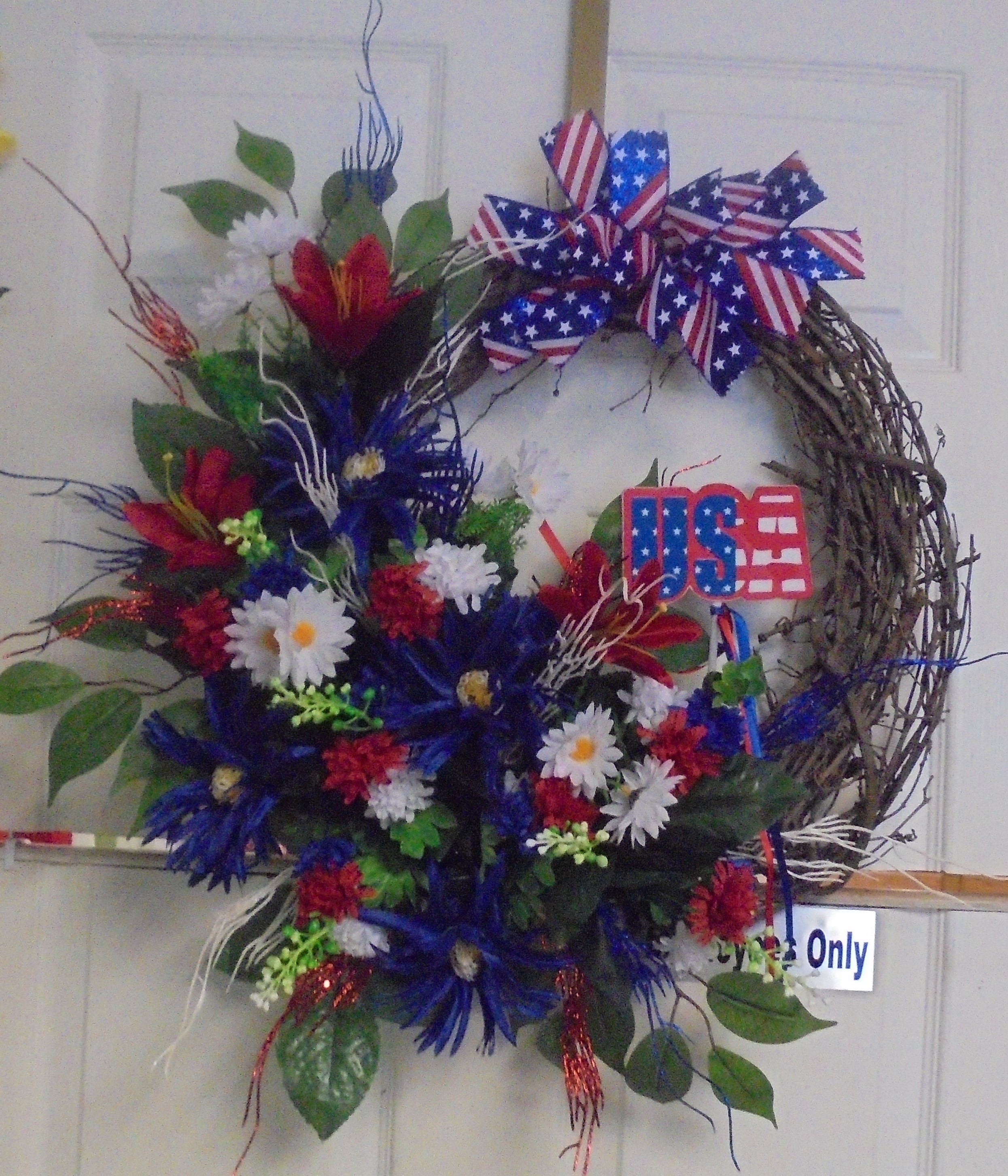 (27)  Grapevine Wreath
(Red, White & Blue)
$60.00