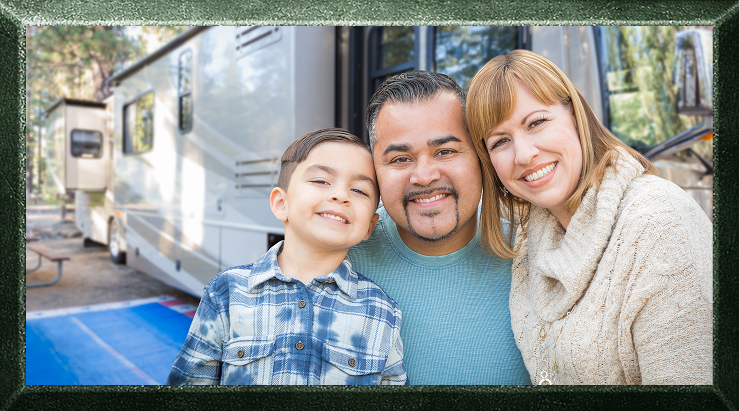 Close up of a family in front of their RV.