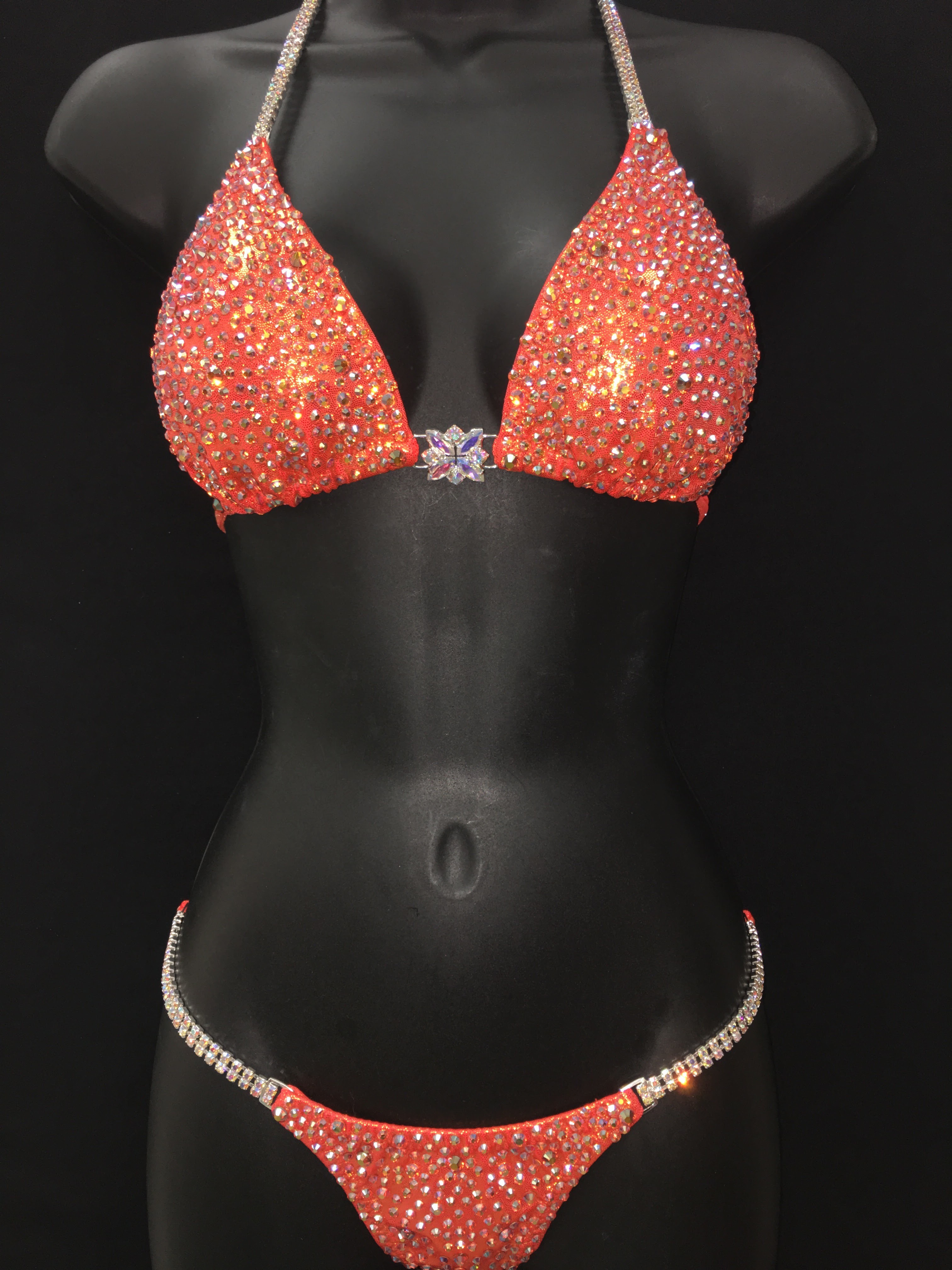 $700 -$900
Hot orange smothered in multi size rhinestones all one color