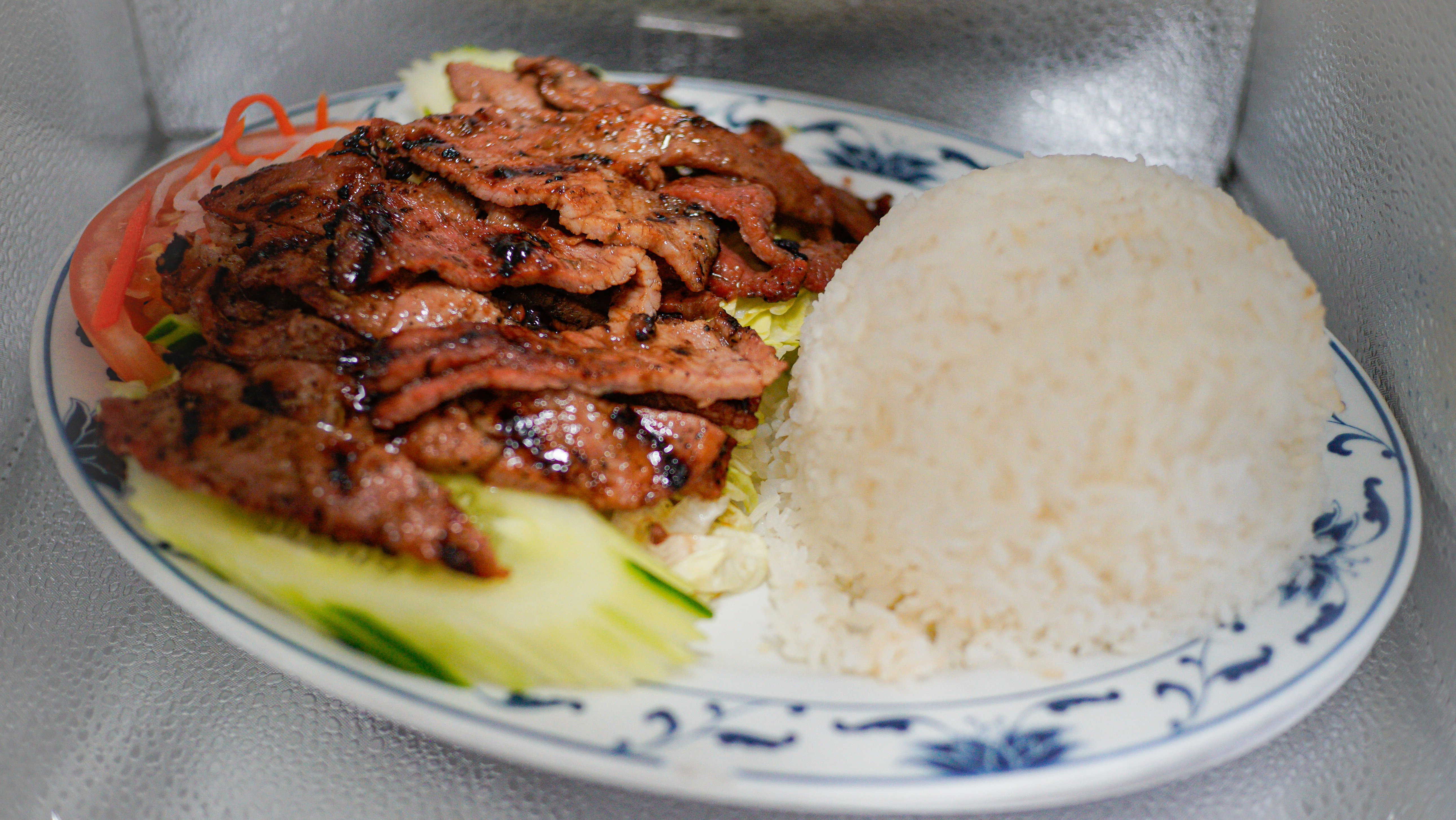 3C. COM HEO NUONG (G)* 
Rice w/ Grilled Pork
Served/ w/ fish sauce on the side