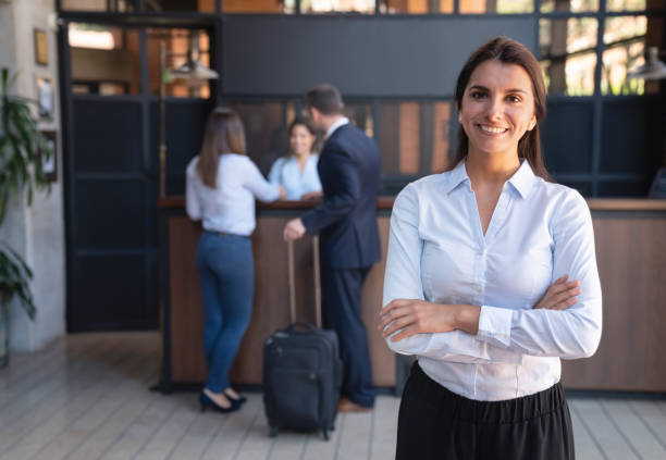 https://0201.nccdn.net/1_2/000/000/188/a7e/beautiful-female-manager-of-a-luxury-hotel-facing-camera-smiling.jpeg