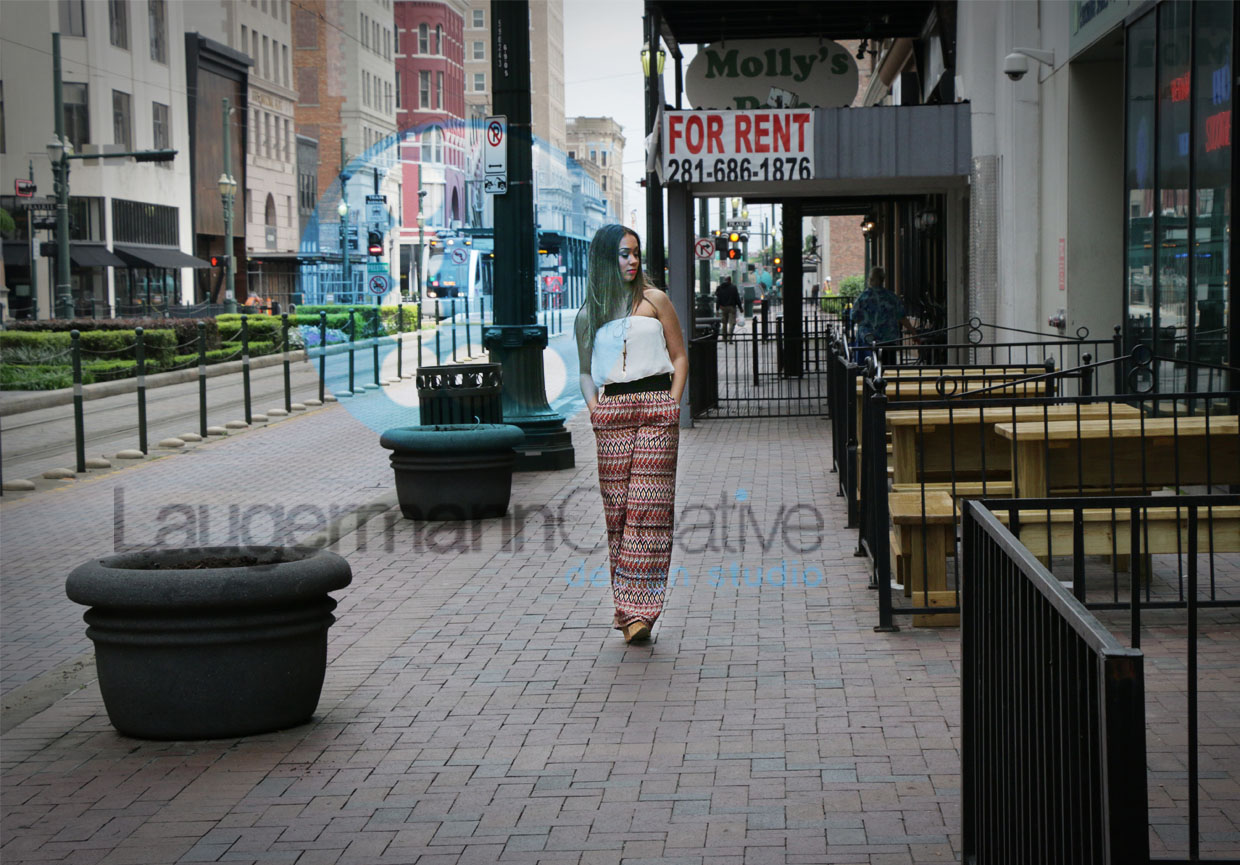 young woman walking on the side walk