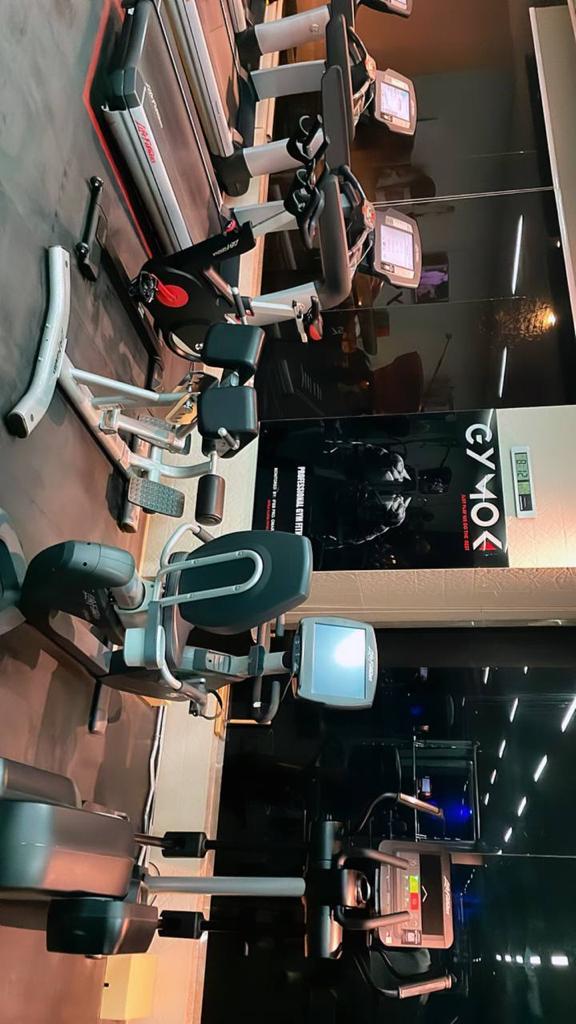 Muscular blond woman in the gym