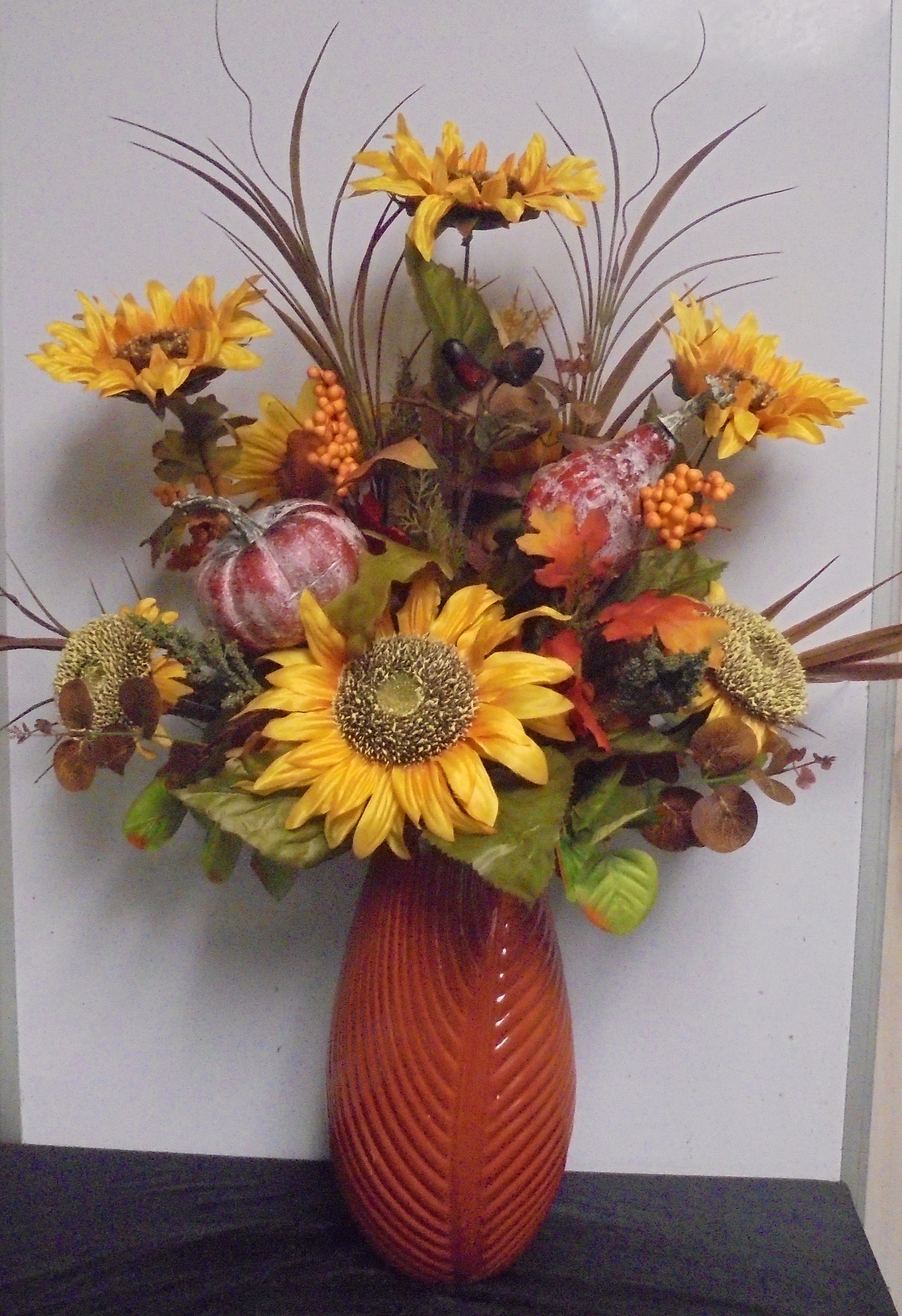 (16) "Silk" Fall  Arrangement
(Sunflower & Pumpkins)
$75.00