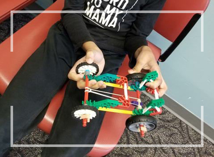 A happy child smiling at the camera