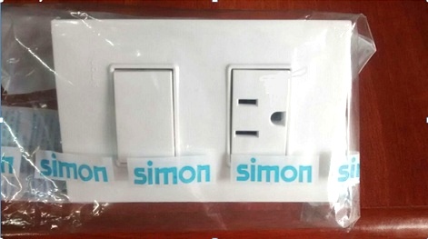 Interruptor sencillo+ toma
 corriente Codigo 23008