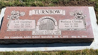 Raised on a slant in cement- double marker