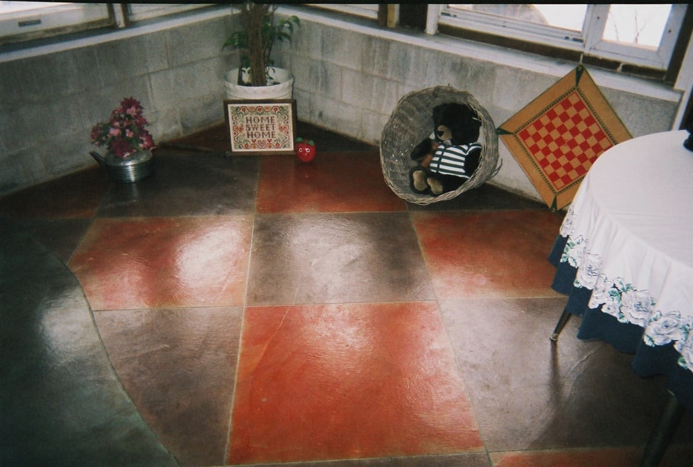 Stained floor with checkered pattern
