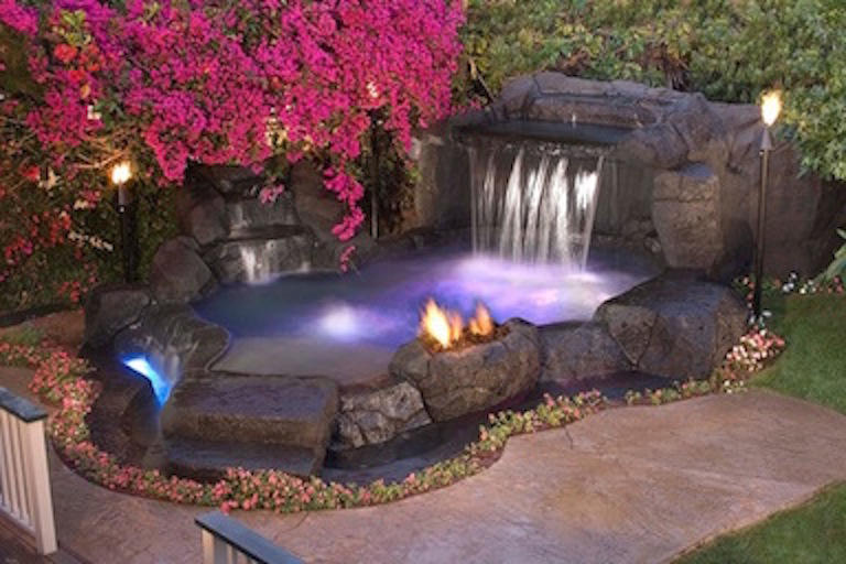Yes, please. Who wouldn’t want a waterfall you can get into in your backyard? 