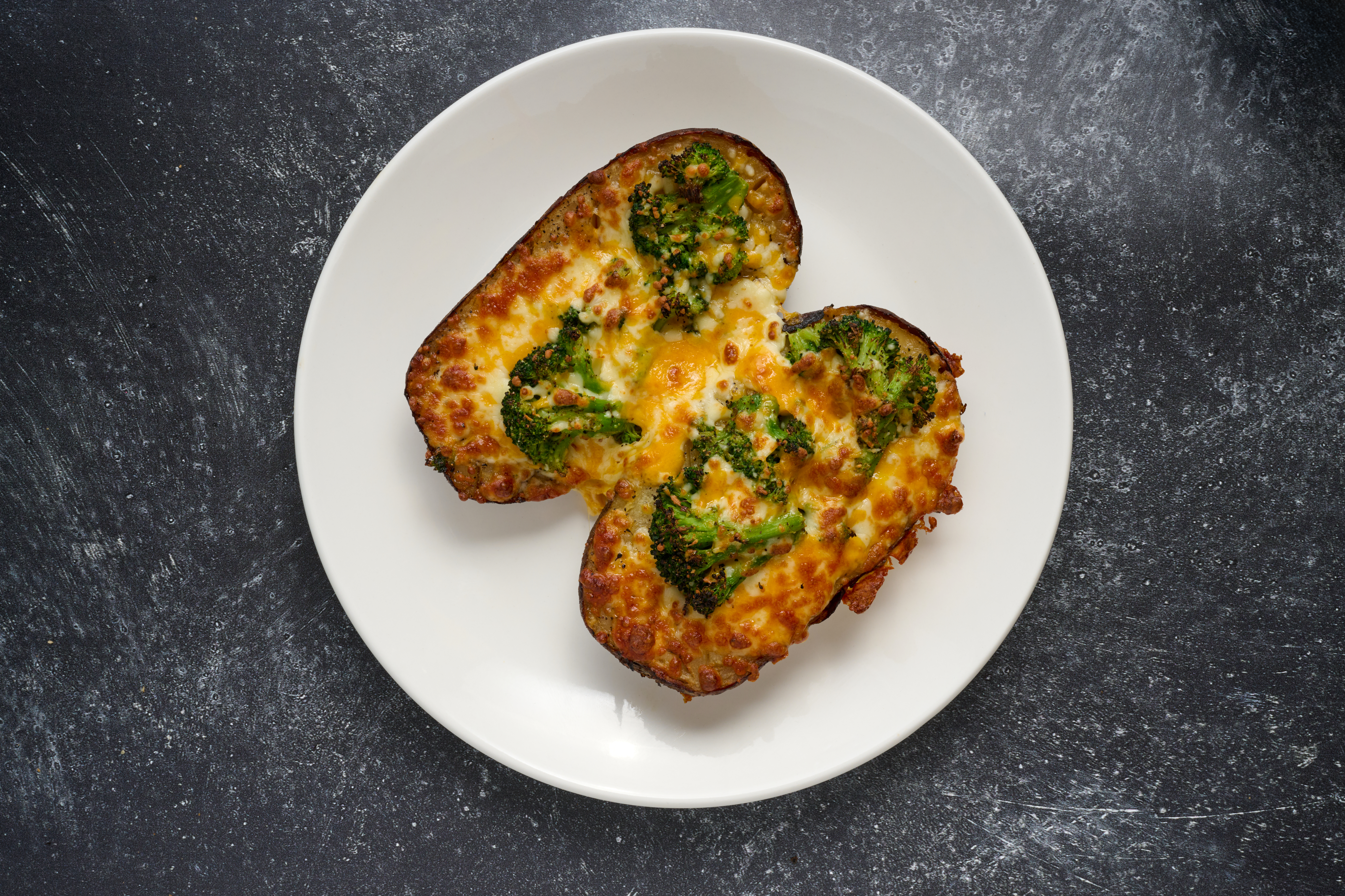 https://0201.nccdn.net/1_2/000/000/18e/235/broccoli-cheddar-baked-potato.jpg