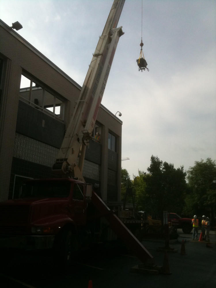 Since this project was on the roof, a crane was necessary to lift the materials.