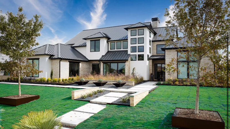 Outside of a home with a lot of windows