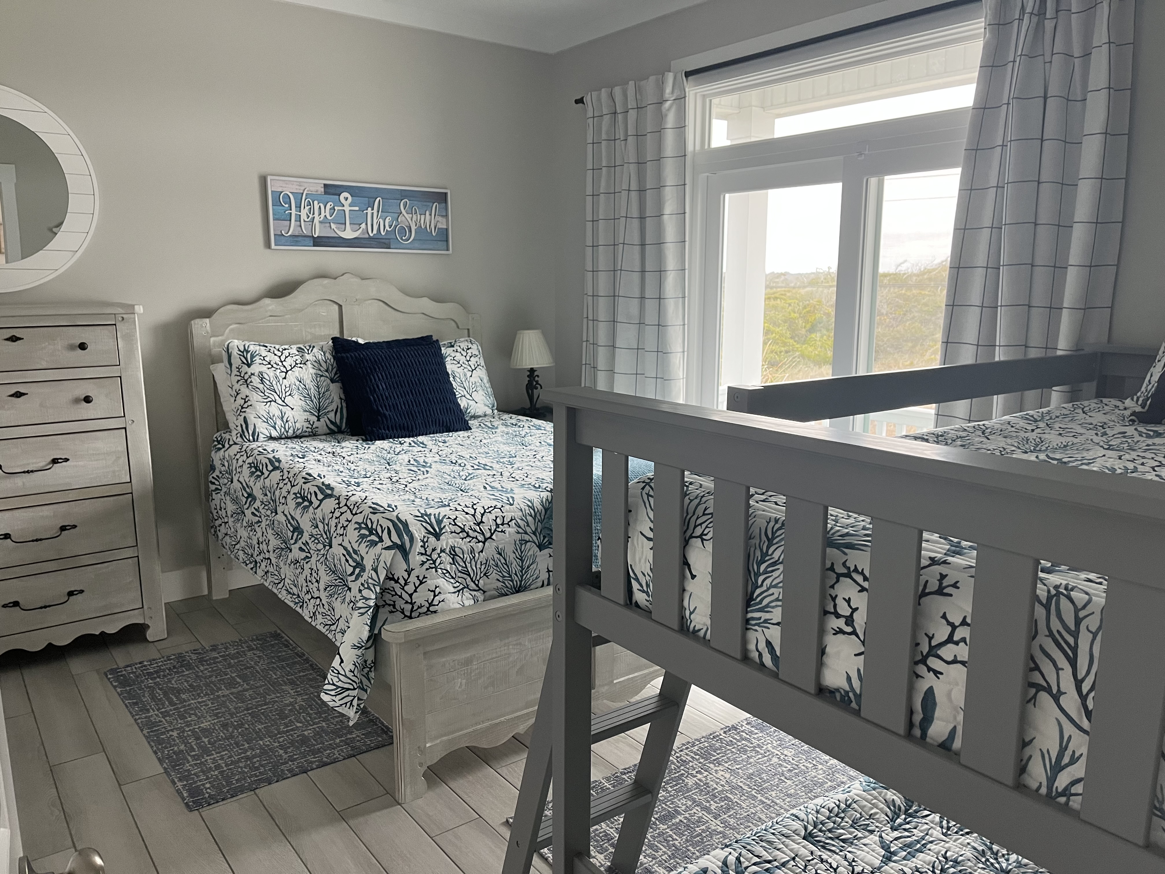 Kids Room with facing the bathroom and 32" TV for kids movie night.
 Double bed and twins shown.