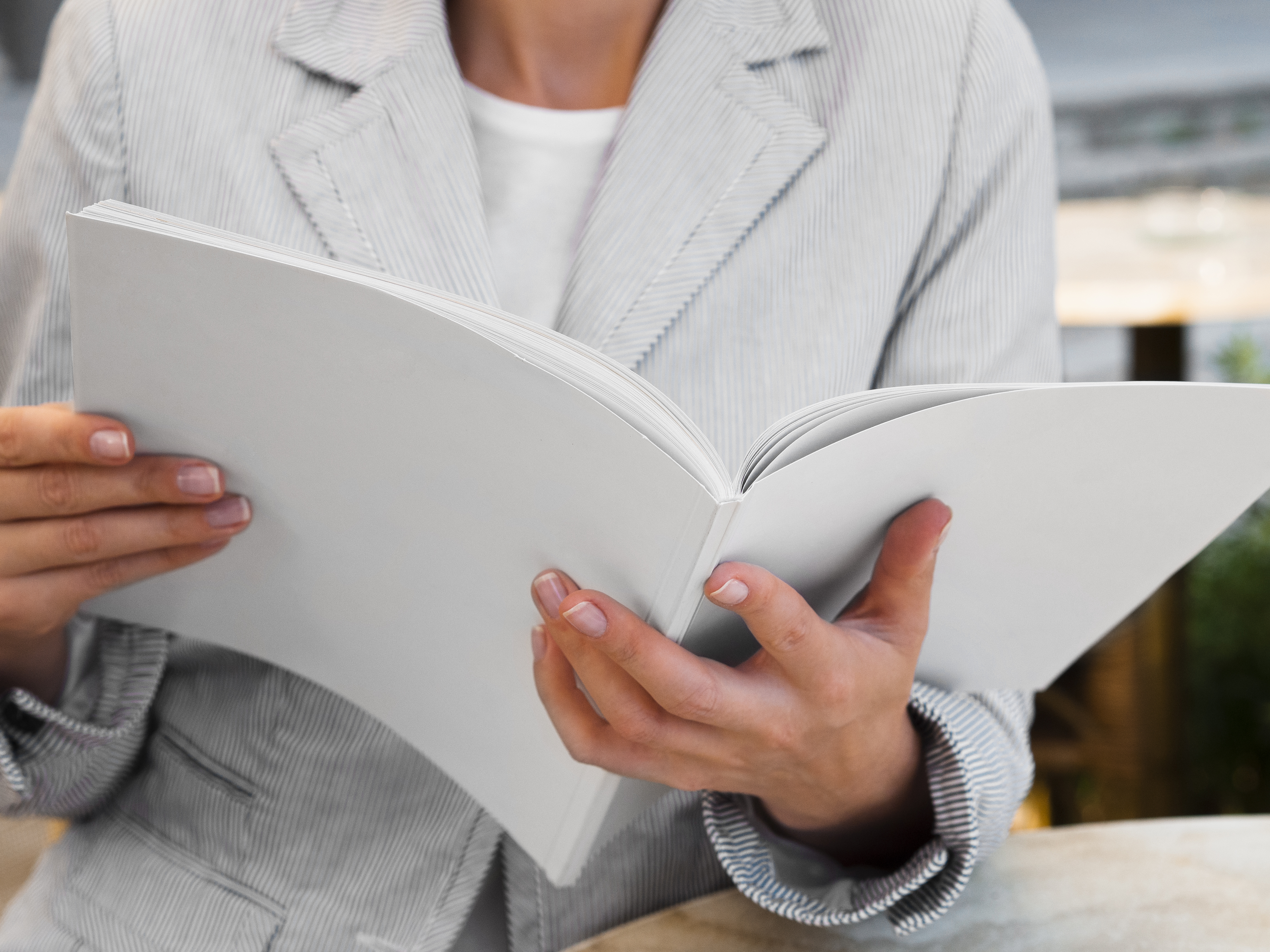 Group of professionals having a discussion in an office setting, with one wearing a stethoscope.