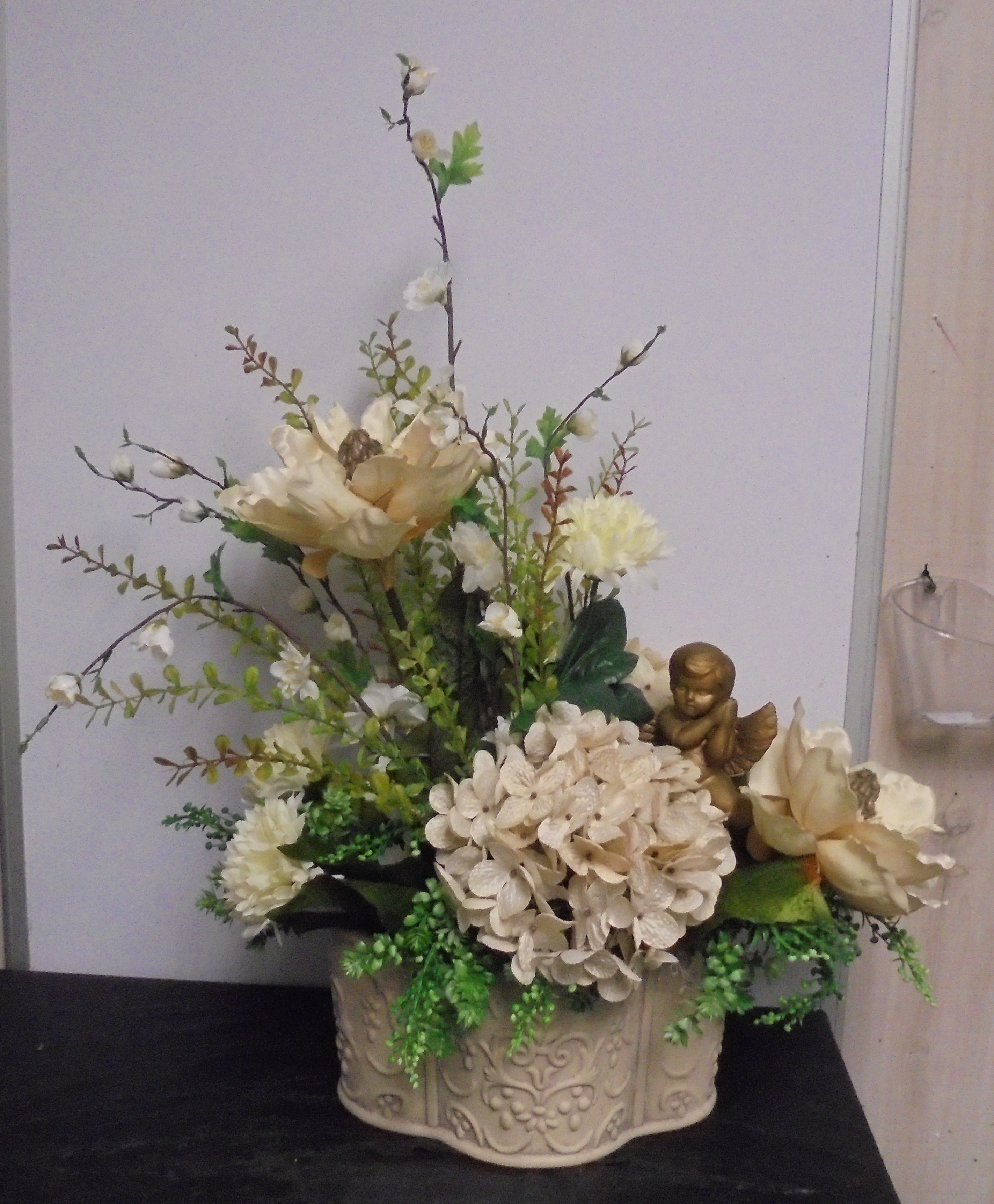 (48) "Silk" Arrangement
(Beige & Cream W/ Angel)
$65.00