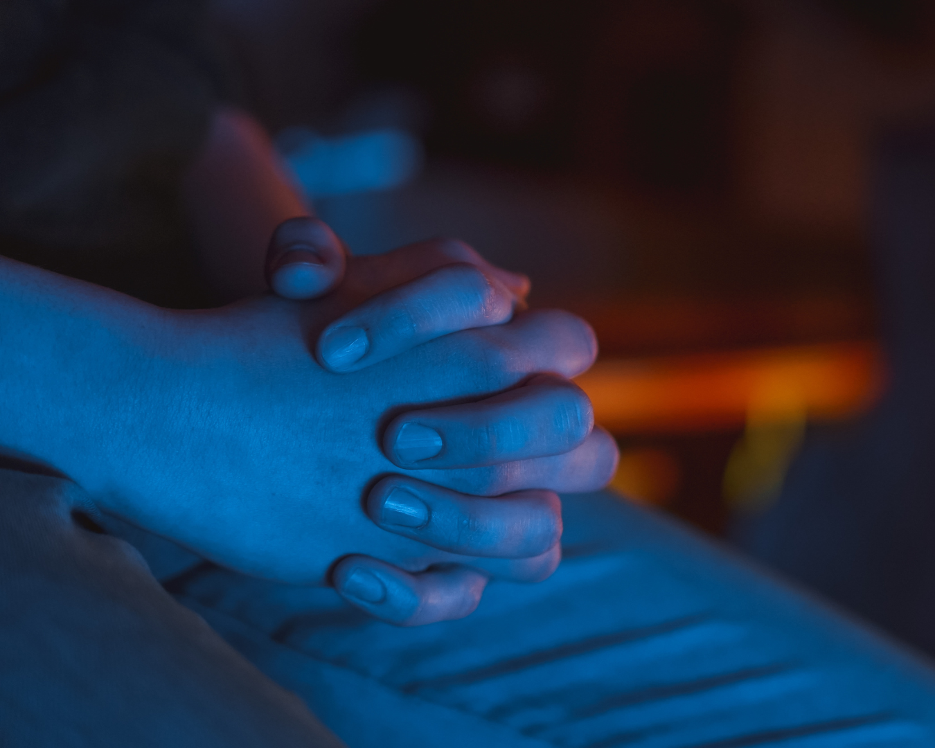 Prayer hands contently folded