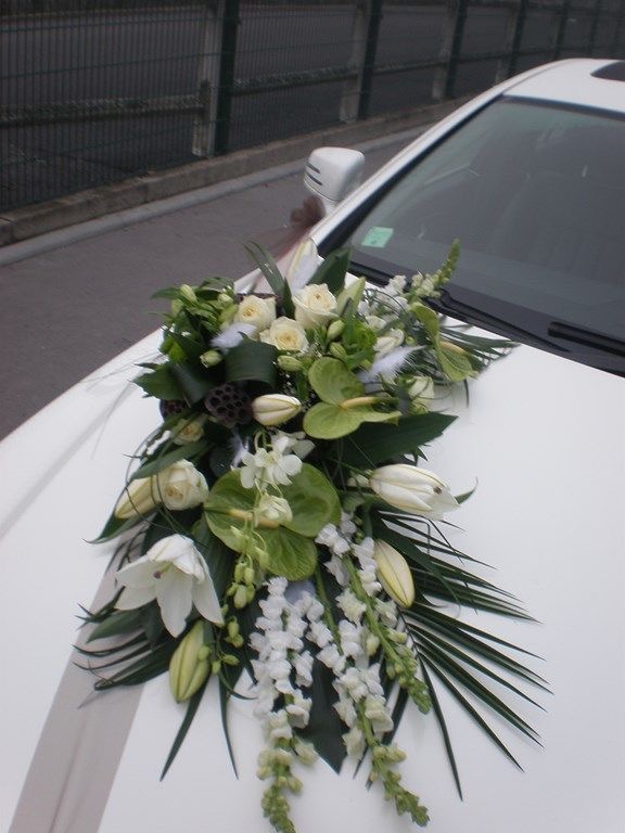 Woman wearing a pink dress and grey boots