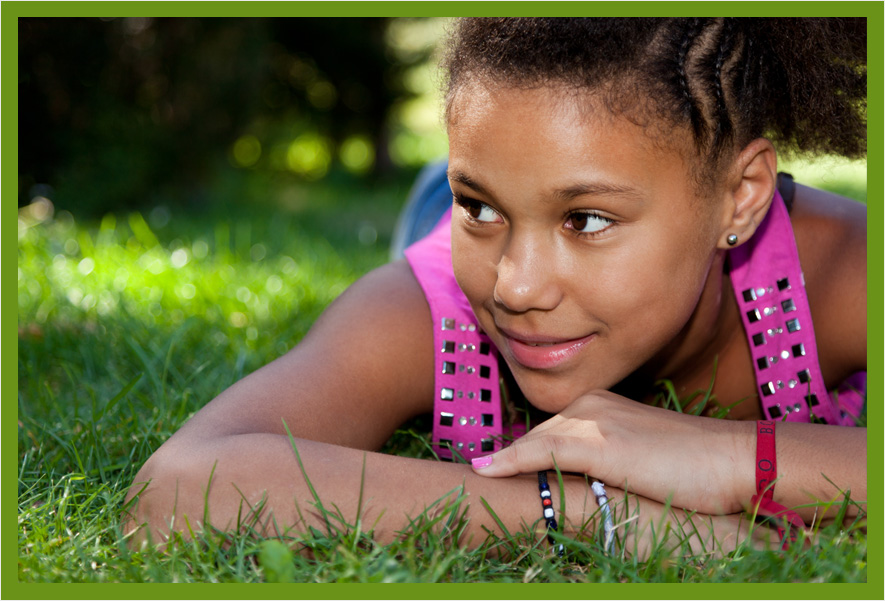 Girl laying in grass||||