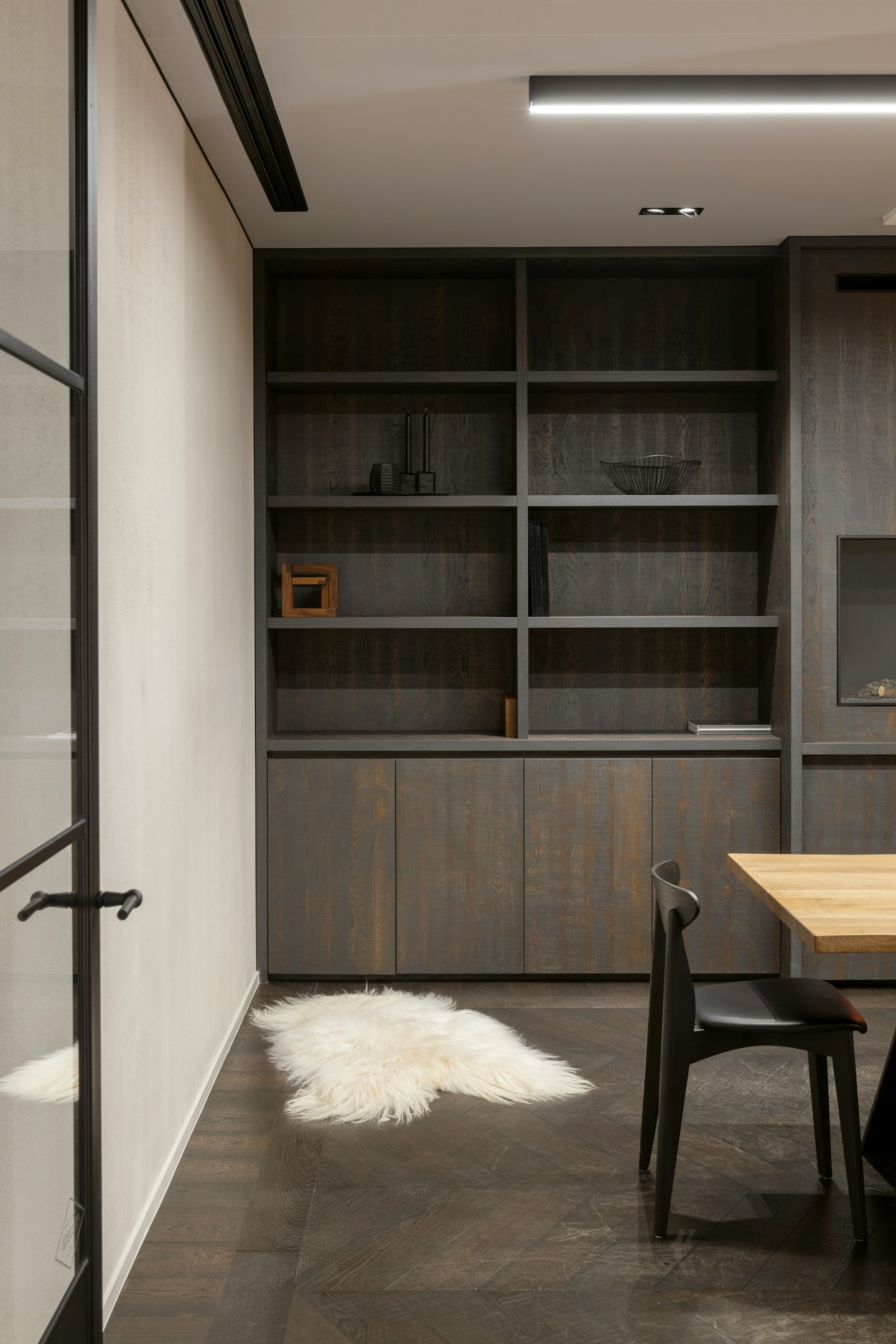 white fur textile on black chair