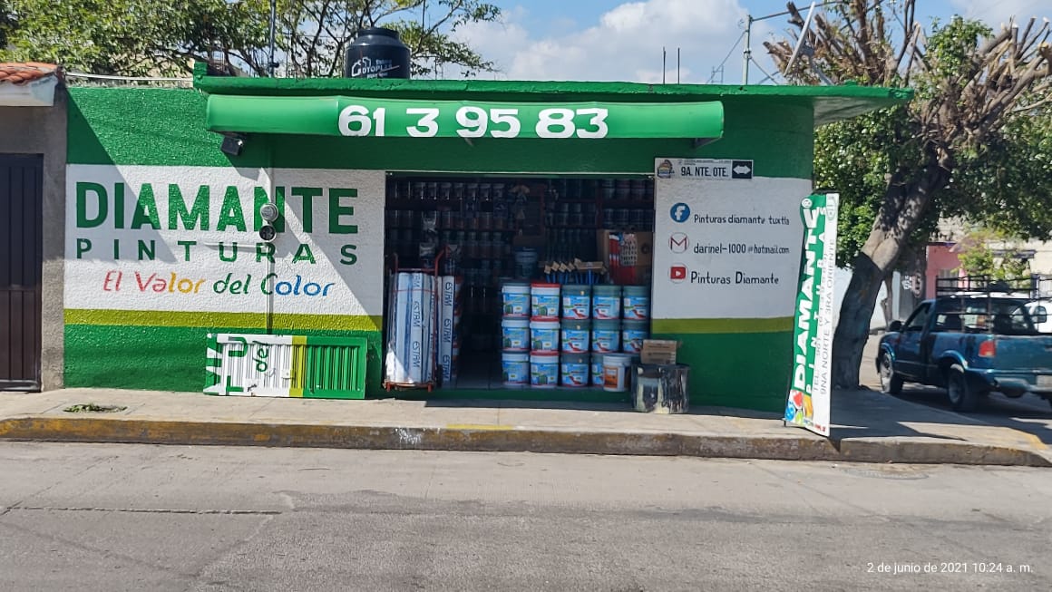 Logotipo de Diamante Pinturas con texto en color verde.