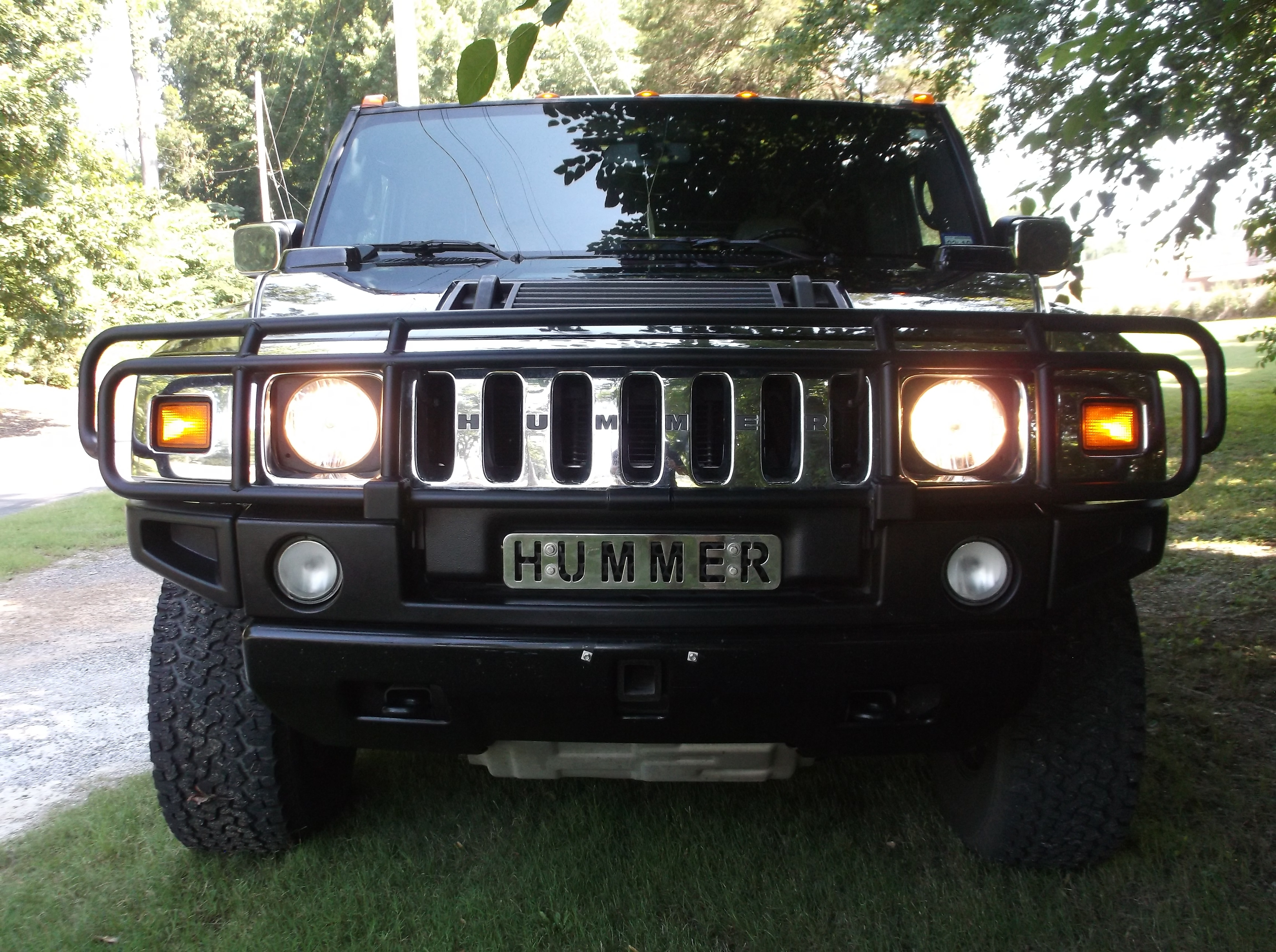 https://0201.nccdn.net/1_2/000/000/195/b5f/2003HummerH2Black_0072-4608x3440.jpg
