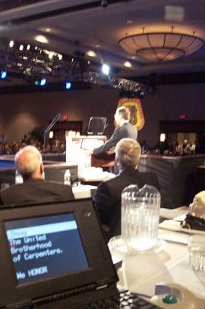 A speaker uses Presidential Prompters to give his remarks.