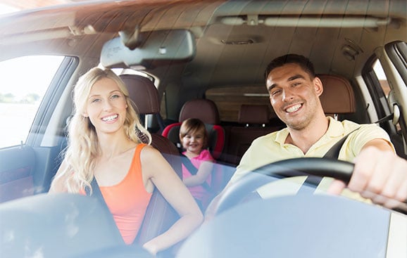 Happy Family Riding in a Car