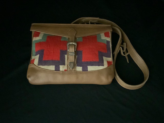 PRODUCT PROFILE:
Product No.:  #21310
Description: Navajo blanket/leather bag 
PRODUCT NARRATIVE:
• handmade in USA 
• Navajo blanket 
    from 1930’s
• silver buckle
• lined interior 
