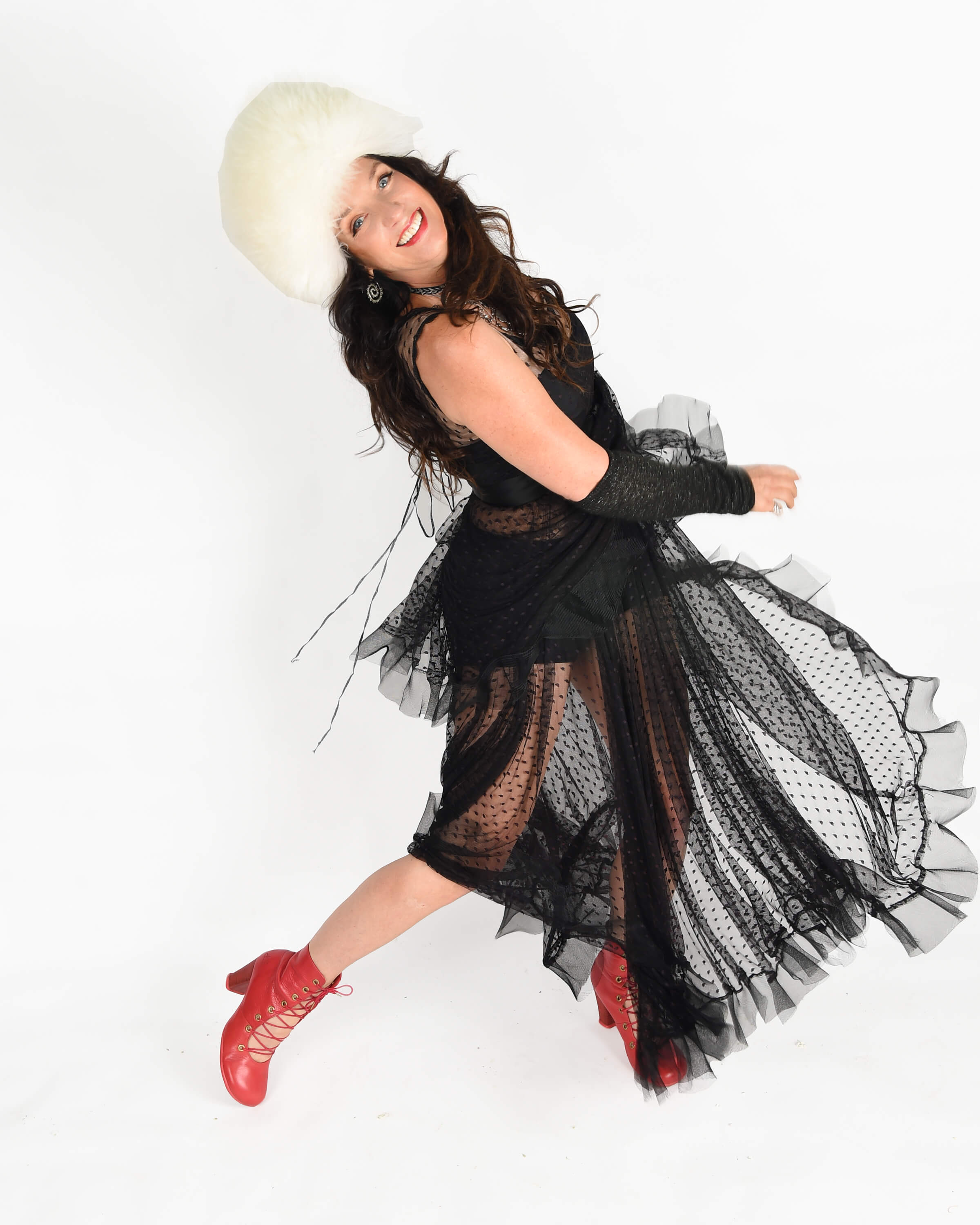 https://0201.nccdn.net/4_2/000/000/000/f17/black-dress-white-hat-walking.jpg