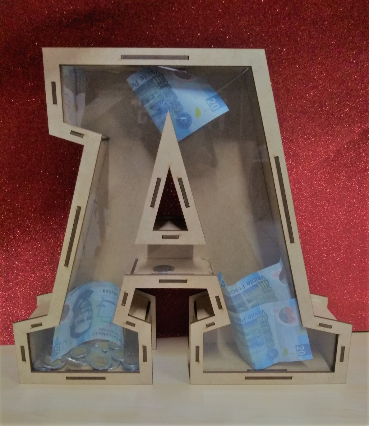 Alcancia Letra 3D
30 cm Alto, 06 cm Profundidad
$250.00