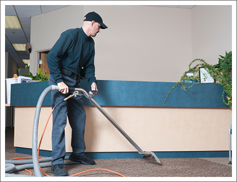 Man cleaning office building|||| Man cleaning office building||||