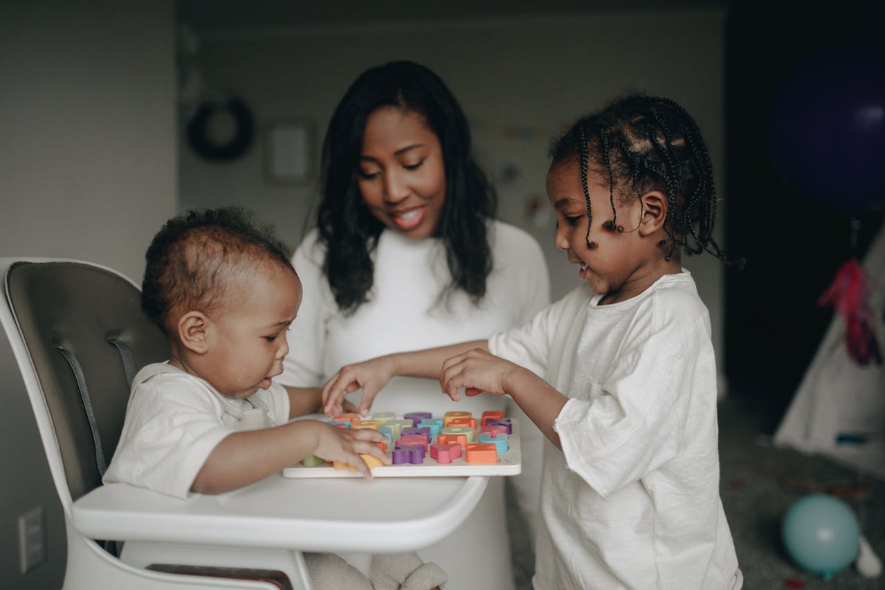 Mother and Kids Playing