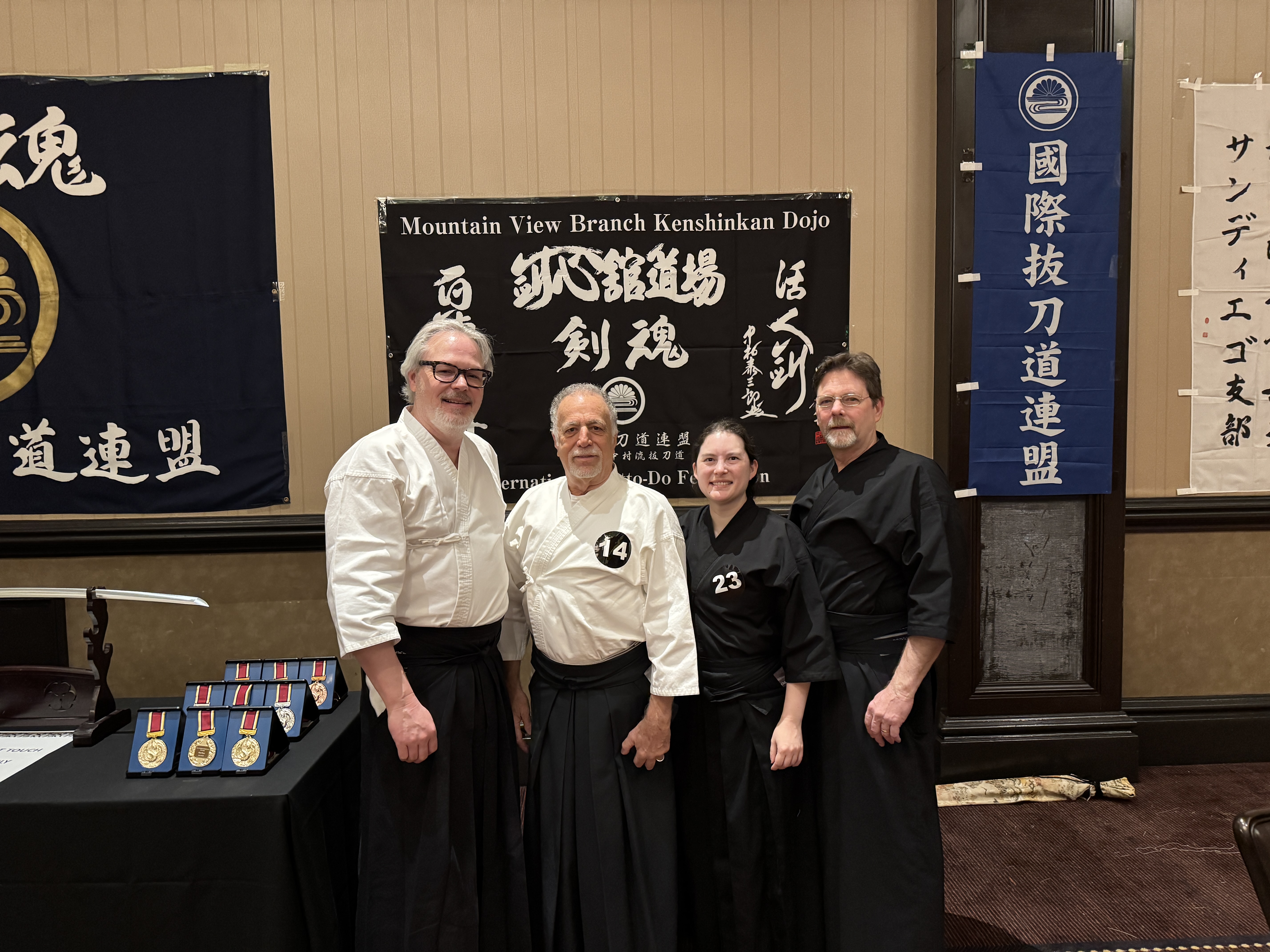 Members of Kenshinkan - Joe, Katie and John all attending their first taikai.