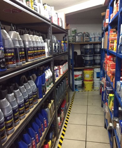 Automotive technician fixing a car