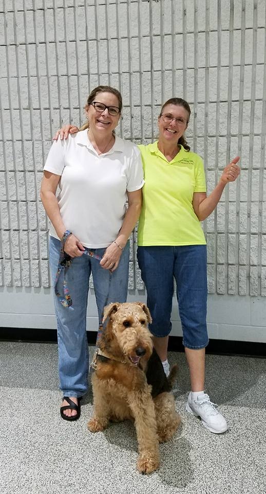 Two Women And A Dog