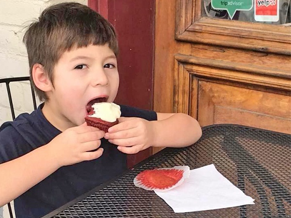 Boy Eating Cupcake