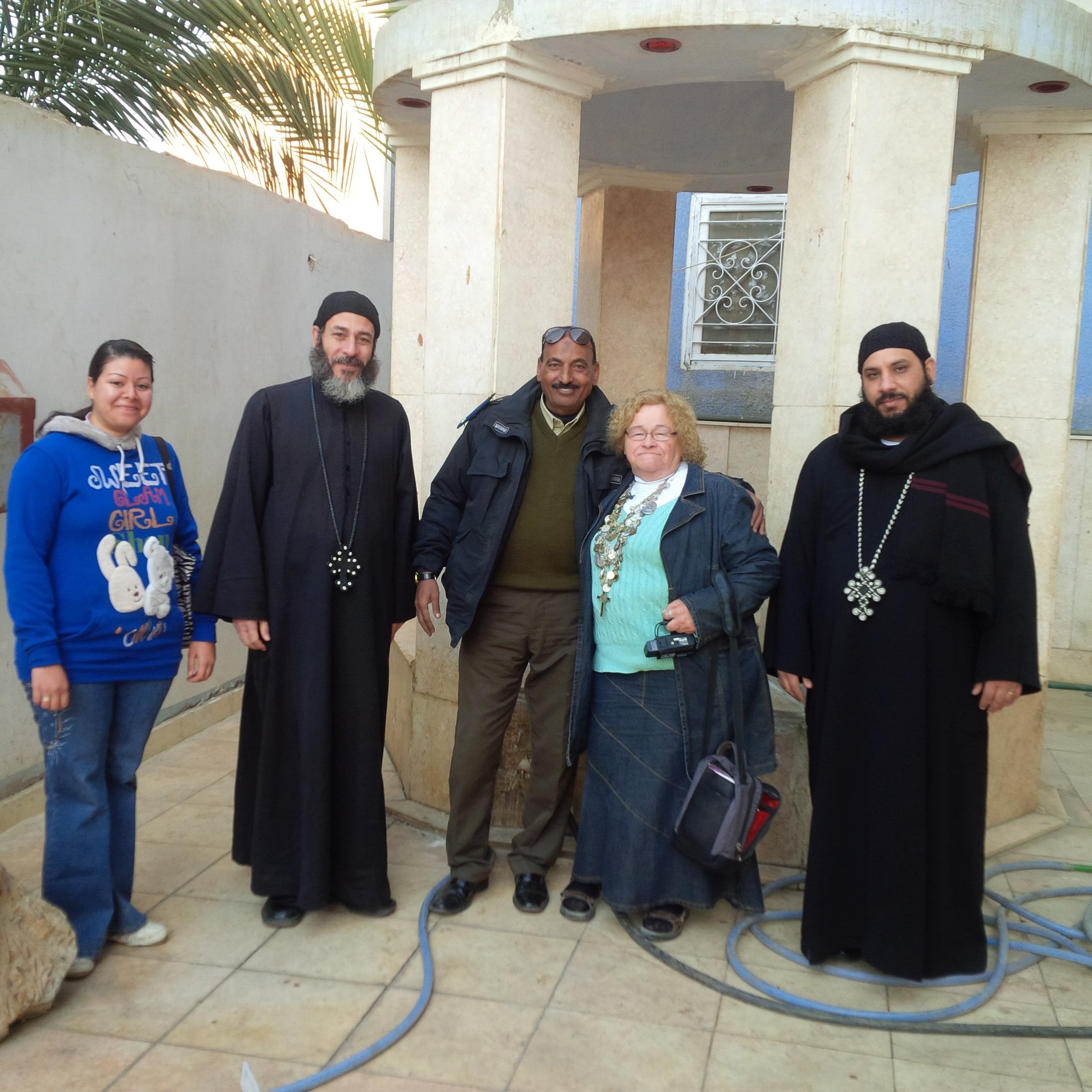 Friend, Priests AND SECURITY
by the well in Church Courtyard.
Our Lady had Jesus get water.