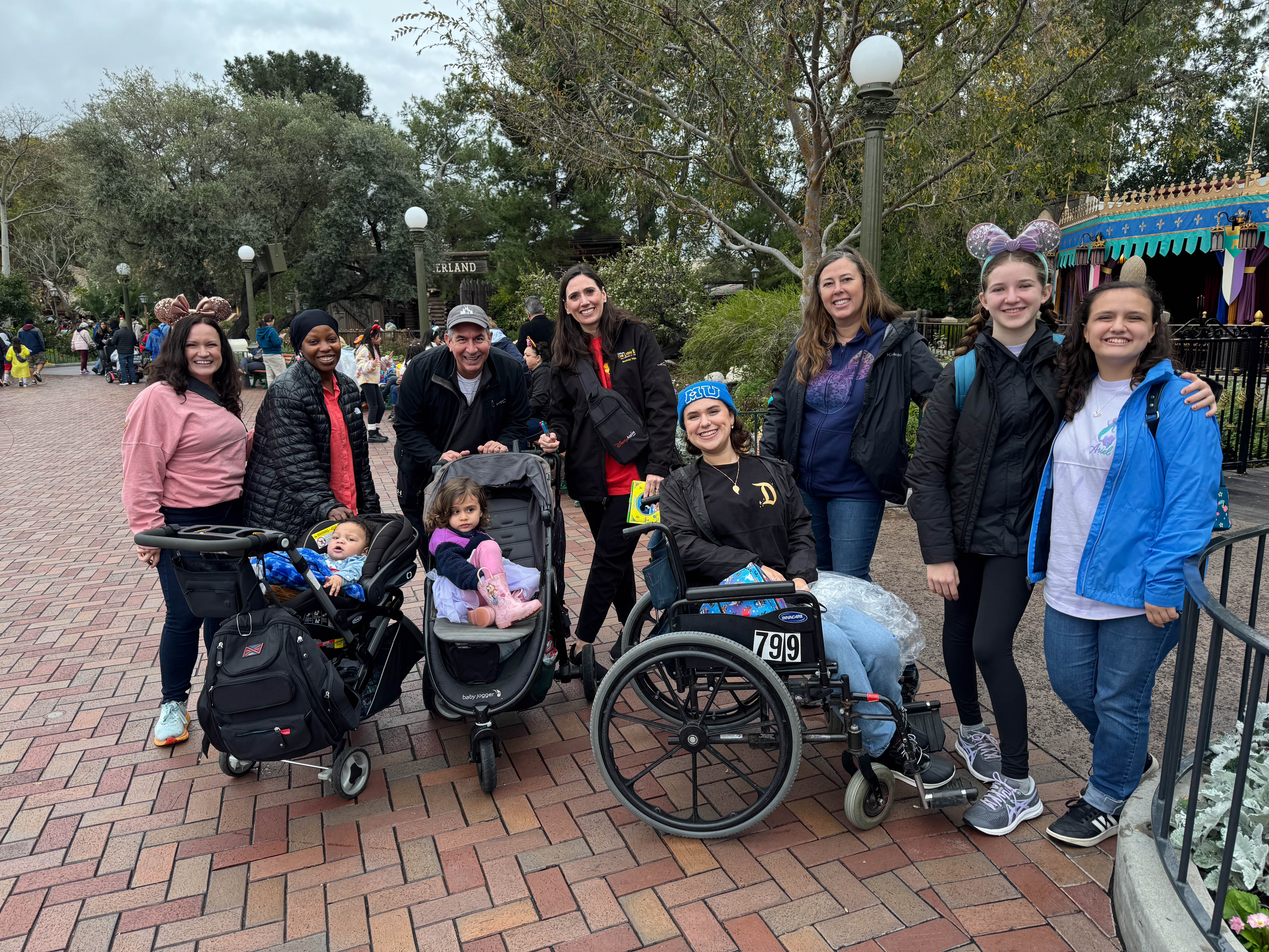 My Plantar Fasciitis and a long day at Disney don't mix, so I get pushed around in my chariot.