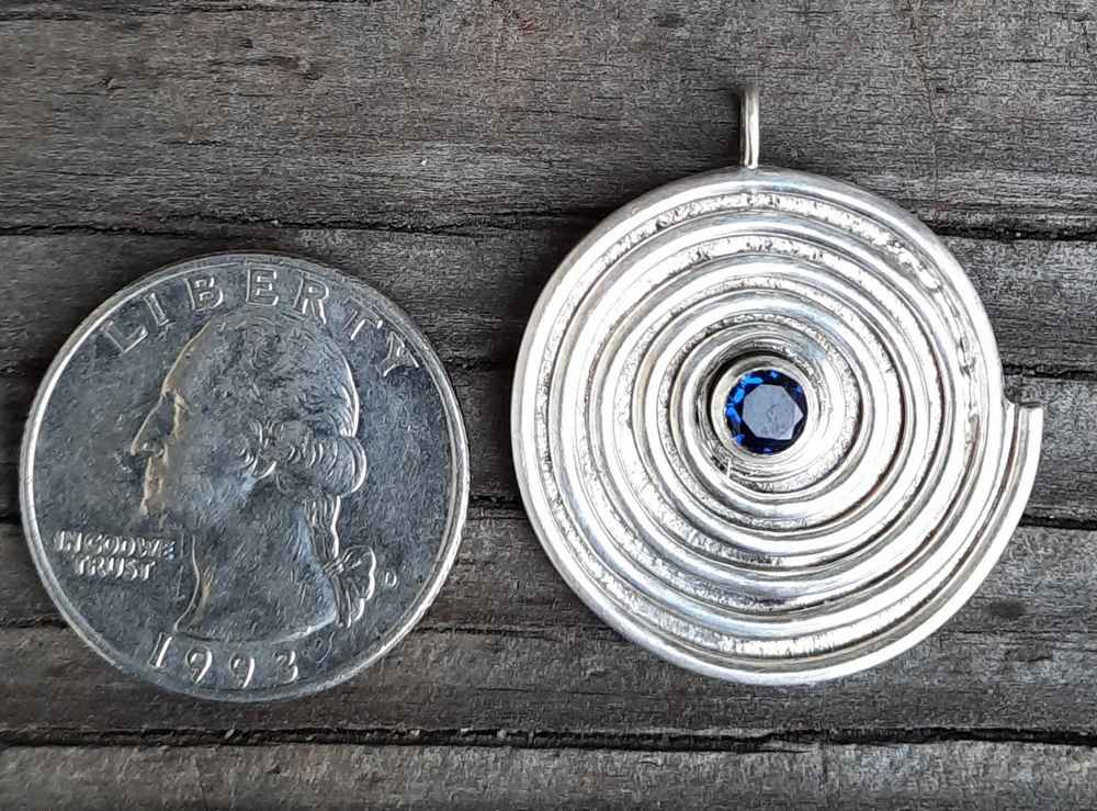 JPn022a-SF SILVER SPIRAL Cast Sterling with  Sapphire faceted