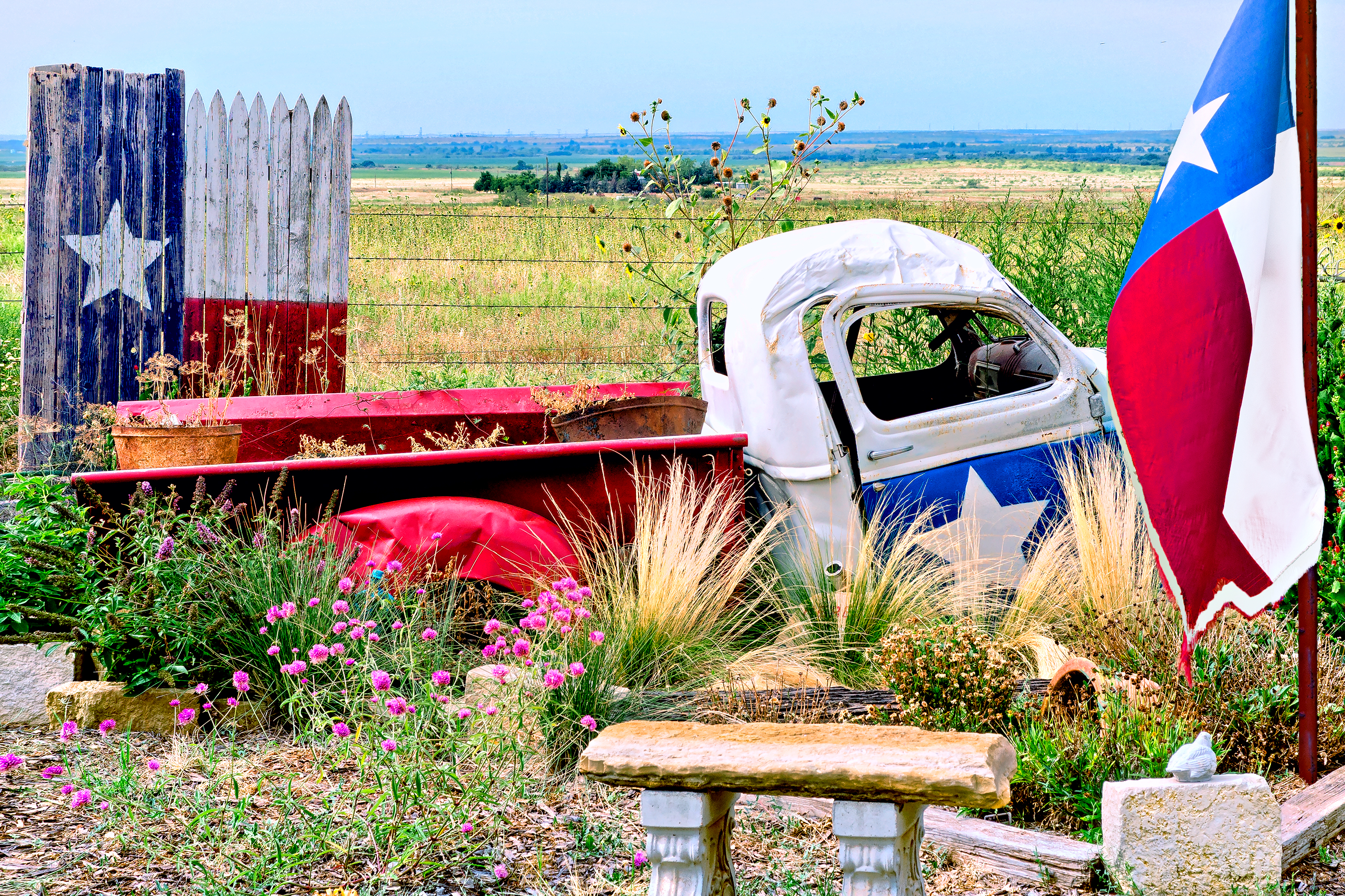 OLE' TEX - That was the name of this old truck used as a garden sculpture at the entrance to a ranch in Texas.