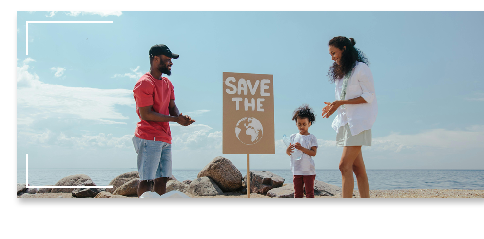 Family participating in a beach cleanup Family participating in a beach cleanup