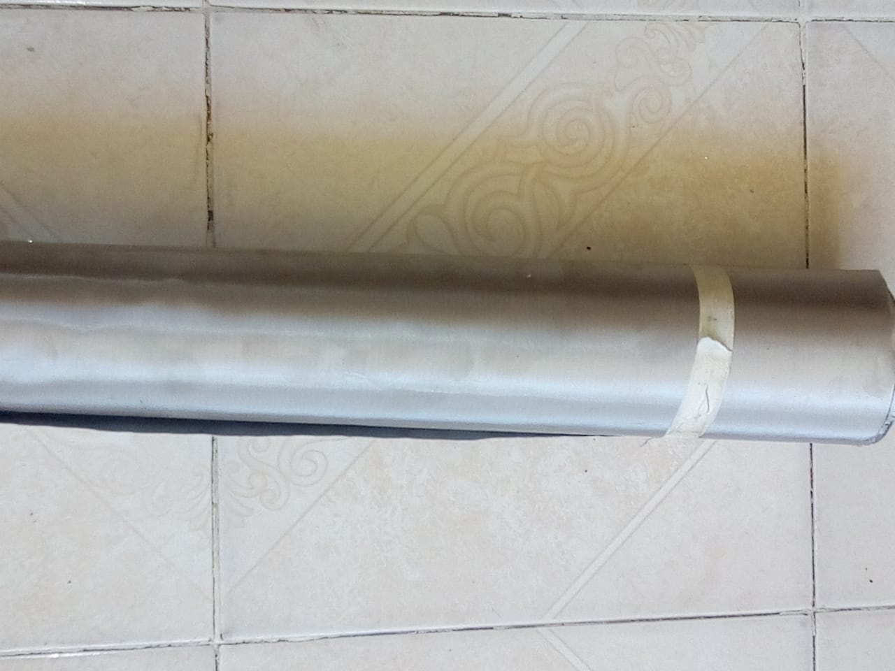 Automotive technician performing an oil check