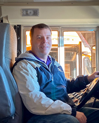 Al B started driving for us in 2012 out of Waconia. Al likes the variety of being inside and outside of the bus, enjoying the scenery and being mobile - think “office with a view.” In his free time Al enjoys watching tv, going for walks, playing boardgames and cards.