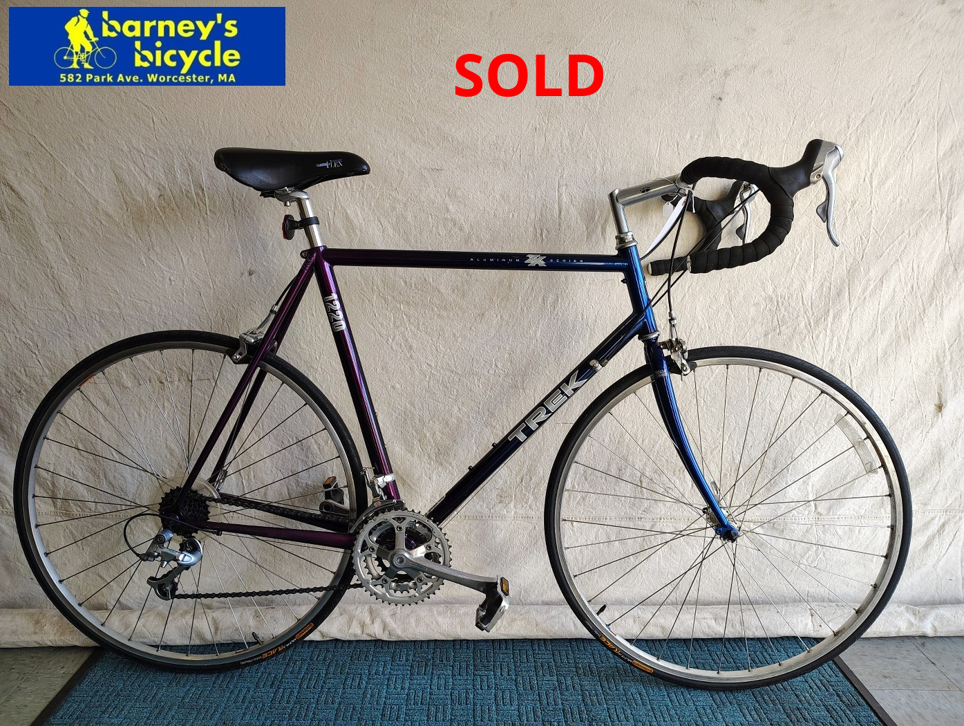 Trek 1220
Frame Size: 58cm LG Aluminum
Rider Height: 5'10-6'1
Drivetrain: Shimano RSX 3x7
Price: $619.00 (Professionally Tuned)
