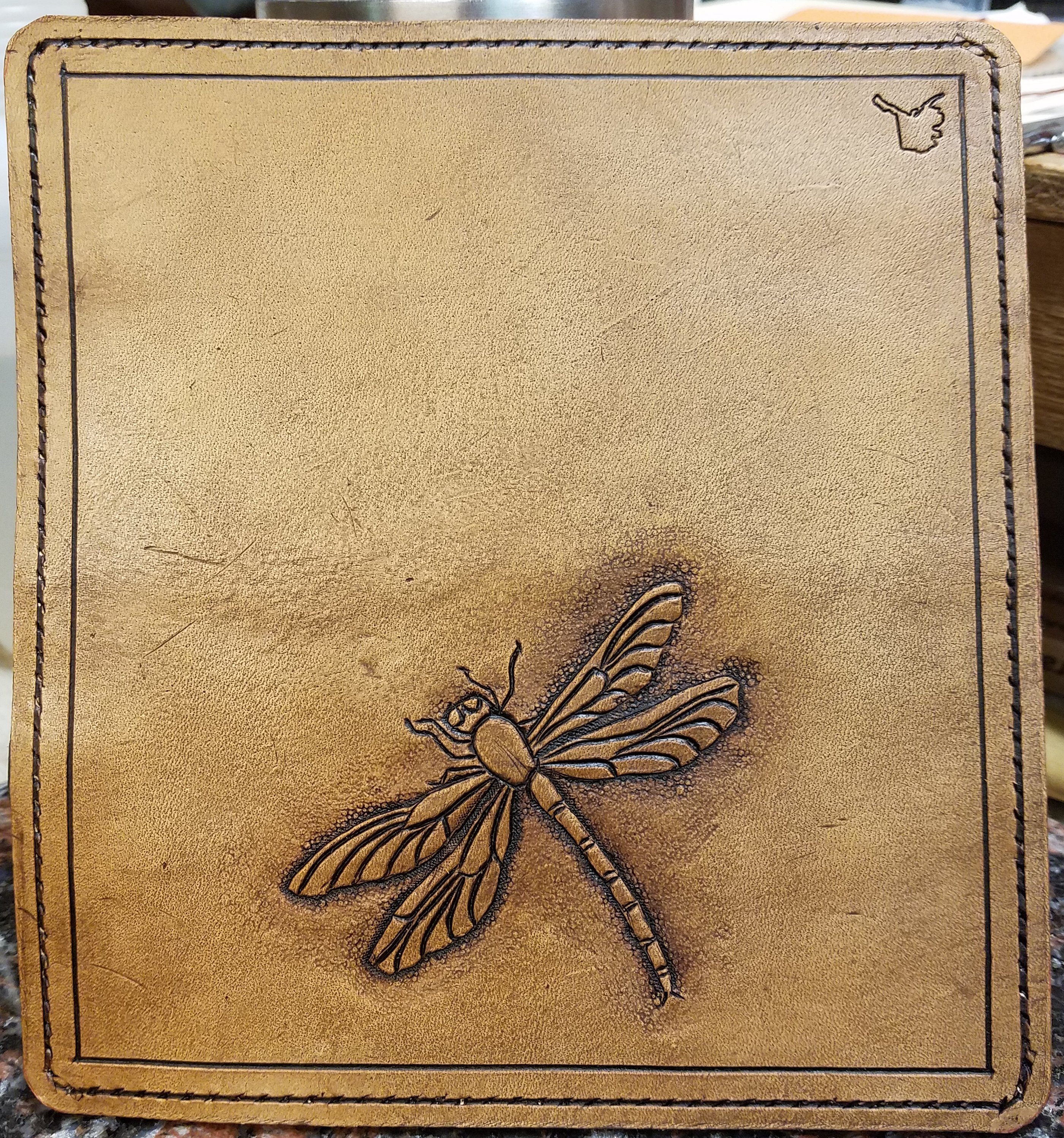 Dragonfly checkbook cover, hand tooled and stitched, $85.00    SOLD